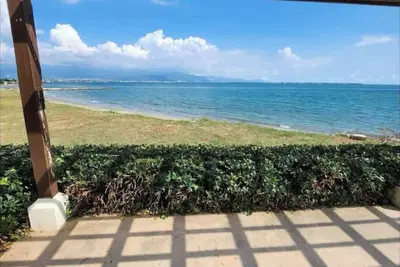 Relax by the pool with the sounds of waves and enjoy   ocean and mountains views