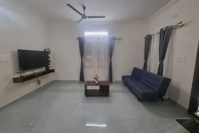 Image de Stay at your comfort of a home with basic cooking range and comfortable beds.