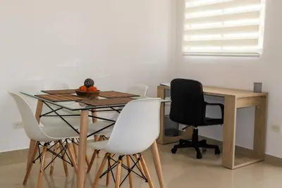 Image de Charming 2-bedroom apartment with high speed WiFi, Netflix, Ac in Barranquilla