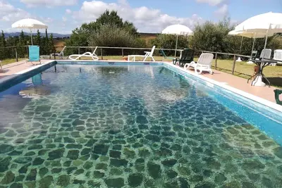 Image de 3-room apartment between Assisi, Perugia and Gubbio. Pond and swimming pool.