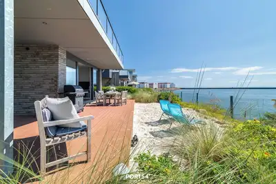 Image de Dock 76 Main - front row, large terrace, sea view, close to the beach, e-charging station