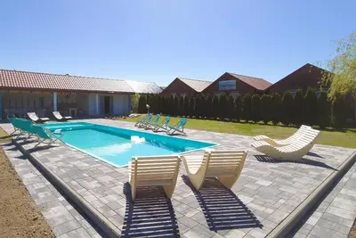 Image de Maison de vacances Rusinowo pour 1 - 7 personnes avec 2 chambres à coucher - Maison de vacances