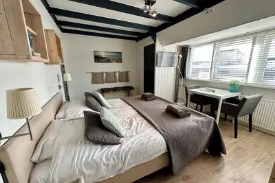 Image de Nice studio with small terrace and parking lot. Only 200 meters from the sandy beach