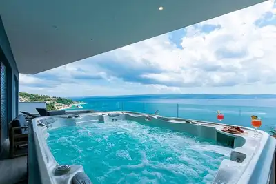 Image de Modern Villa for Large Groups, Private Heated Pool, Sauna, Jacuzzi, Gym, Games Room & Sea Views!