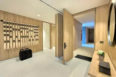 Image de Rez-de-chaussée, piscine privée, salle de sport, club de plage, service de ménage