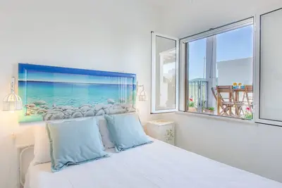 Image de Confortable appartement pour 5 personnes avec Wifi, climatisation, Tv et véranda, près de Ostuni