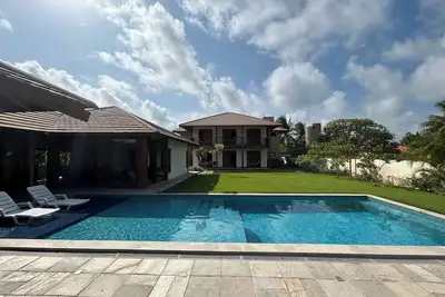 Image de Enseadinha Serrambi - Luxurious pool house with 6 suites (18 people), pool and court