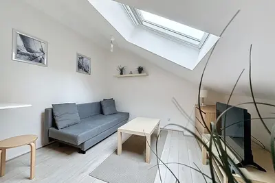 Image de Le Nid de Reims Studio cosy idéal pour un couple.