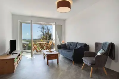 Image de Appartement 'Landglück Hof' avec vue sur le lac, jardin partagé et Wi-Fi