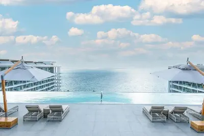 Image de 2br w/ Wifi, W/D, resort and beach access, adults only rooftop, Ai optional