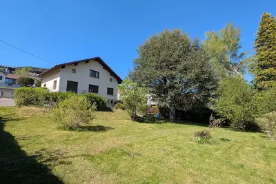 Image de Maison à Gérardmer avec vue sur montagnes, garage et jardin