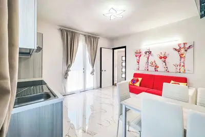 Image de Appartement moderne avec terrasse pour familles nombreuses à Bibione
