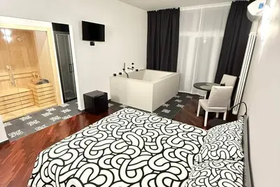 Image de Panta Rei Charming Rooms and Spa Era room with private spa for exclusive use.