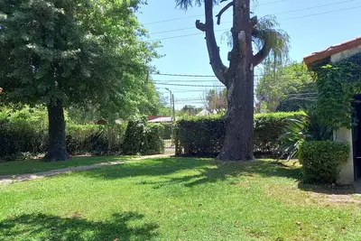 Image de Guest House Muñiz, park 1000m2 20m2 cub. bath w/shower detachable swimming pool