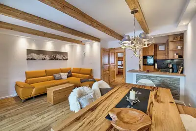 Image de Charming modern apartment \"Glitzeralm\" close to the ski and Three Lakes area.