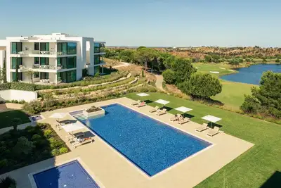 Image de Escape to luxury in the Monte Rei 3-Bedroom Penthouse Apartment with a communal heated pool and stunning views