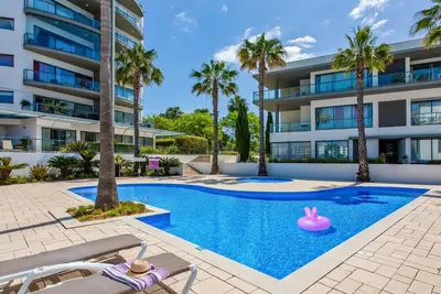 Image de Experience ultimate relaxation in Quarteira's beachfront paradise.