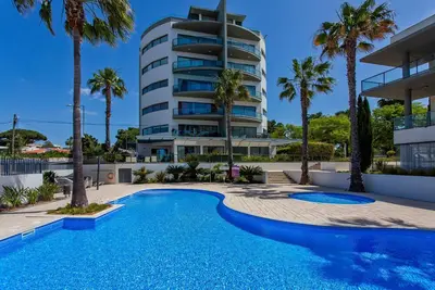 Image de Relax by the pool at this Algarve apartment gem.