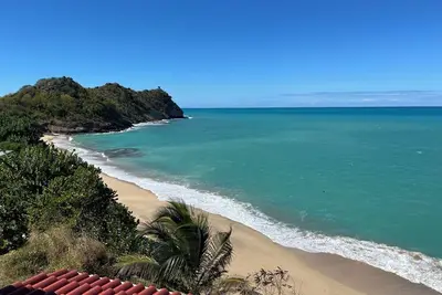Image de Enjoy breathtaking ocean views from a private patio, steps away from the beach.