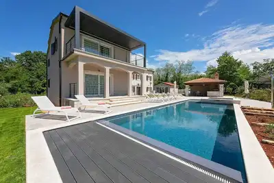 Image de Villa with a pool for 14 persons, with sauna and jaccuzzi, 2 separate units