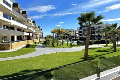 Image de 5 minutes from the beach! Luxury apartment, spacious terrace and right by pool!
