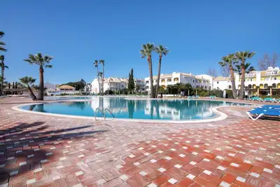 Image de Appartement \"Golden\" avec piscine partagée, Wi-Fi et climatisation