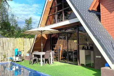 Image de A-Frame Villa with Pool, Ps4, Karaoke, & No Pet Fees