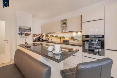 Image de FeWo Lieblingsort - Modern vacation apartment Lieblingsort in Kölpinsee for up to 5 people.
