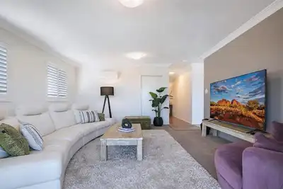 Bright Top-Floor Retreat with City Views