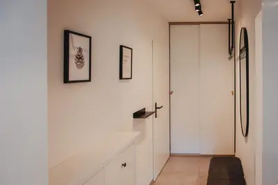 Image de Modern apartment with mountain view and 2 balconies near ski lift, bathing lake & thermal baths.