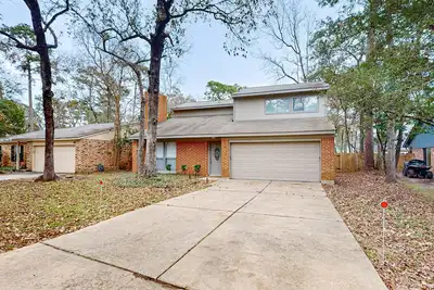 Modern retreat in a quiet neighborhood, close to shopping, & fenced in yard