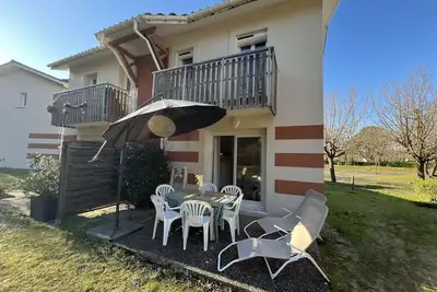 Image de 052 - Maison mitoyenne agréablement située au cœur d'un parc boisé