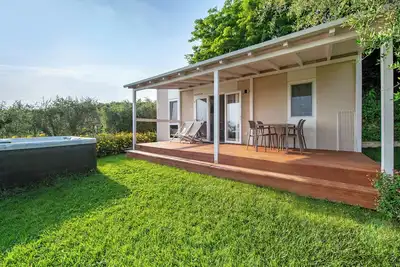 Image de Maison de vacances \"Casa Mobile Casa Est Garda\" avec vue sur le lac, piscine partagée & Wi-Fi