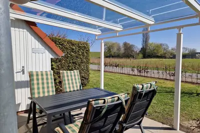 Image de Vacation home Seemöwe with dike view