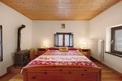 Image de Chalet 'Petite Maison Des Alpes' avec vue sur montagne et balcon