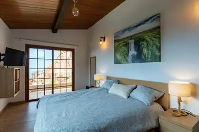 Image de Maison de vacances 'Bencomo' avec vue sur la mer, piscine partagée et Wi-Fi