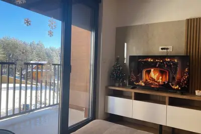 Image de Appartement neuf, entièrement équipé avec Spa, piscine intérieure et place de pa