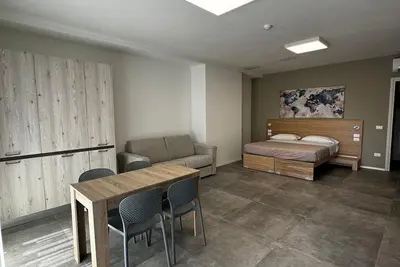 Image de Dormi-Re rooming house offers 12 elegant and comfortable rooms.