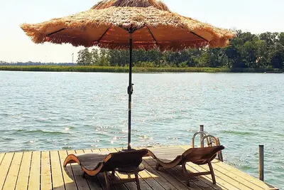 Image de Top floor apartment\/fireplace\/balcony directly on the lake with private jetty & 2, 500 sqm garden