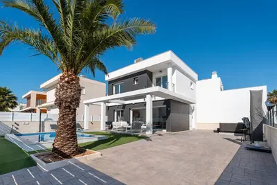Image de Villa 'Casa Bos Palm Tree with Pool' avec piscine privée, Wi-Fi et climatisation