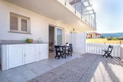 Image de Appartement 'Borgo Degli Ulivi' avec jardin privé et climatisation