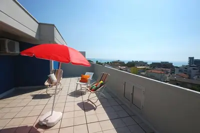 Image de Appartement avec solarium Ă Lignano