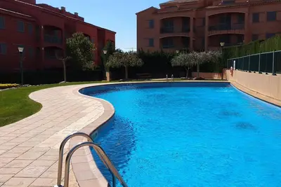 Image de Acojedor Apartamento Familiar Con Piscina Comunitaria Marina Sant Jordi (Msj72)
