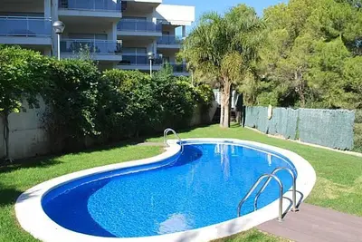 Image de Appartement lumineux avec piscine, accès privé à la crique Cala Llobeta et terrasse spacieuse