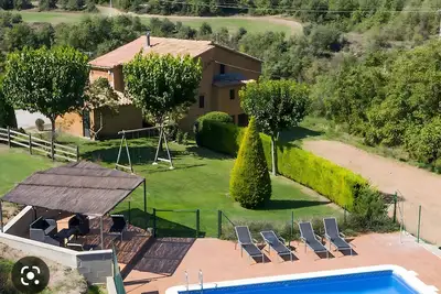 Image de Ferme 'Cal Colom' avec vue sur la montagne, piscine privée et Wi-Fi