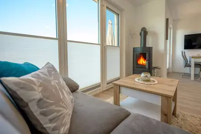 Image de Maison de vacances 'Ferienwohnung Ankerplatz' avec vue sur le lac, terrasse partagée et Wi-Fi
