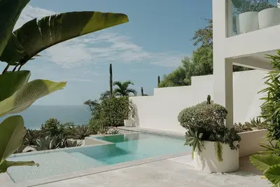 Image de Dreamy King Bedroom Ocean view suite at Sky House Santa Teresa