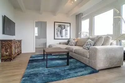 Image de Apartment with a dream view of the Wadden Sea for up to 4 people, approx. 80 m².