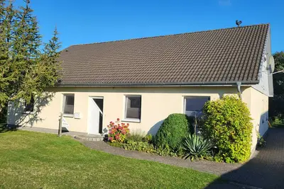 Image de Maison de vacances 'Poolhaus Am Leuchtturm' avec terrasse privée, jardin privé et Wi-Fi
