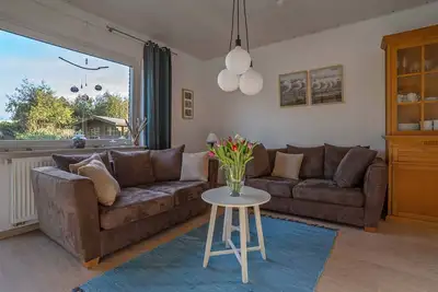 Image de Maison de vacances 'Haus Blauer Wacholder' avec terrasse privée, jardin privé et Wi-Fi